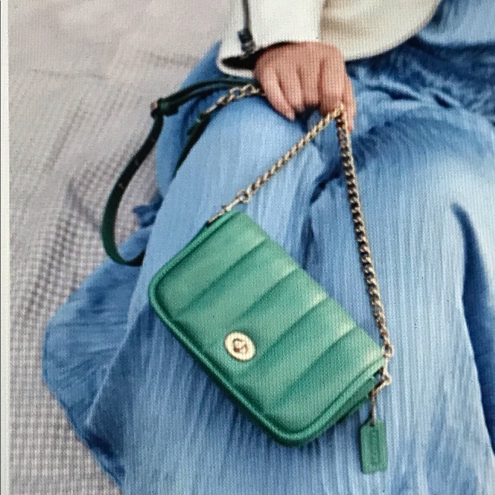 NWOT Coach quilted sea foam green crossbody bag. Excellent condition.